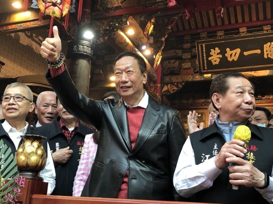 Terry Gou (centre) left the Kuomintang in anger, but now wants to make a comeback. (SPH Media)