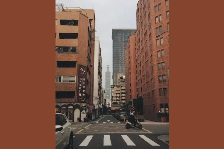 Taipei 101 stands in the background in this Taipei street scene.