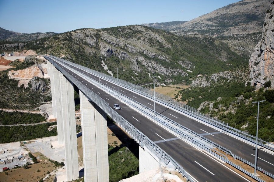 A view of Moracica bridge on the opening day of a 44 km stretch of the planned 165 km highway Bar-Boljare built by China Road and Bridge Corporation (CRBC) after years of delay, near Podgorica, Montenegro, 13 July 2022. (Stevo Vasiljevic/Reuters)