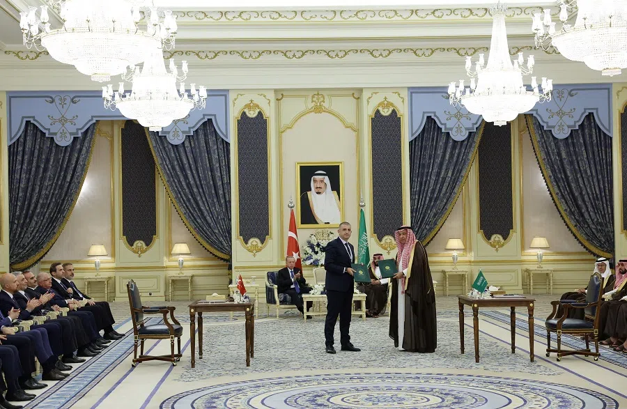 Haluk Bayraktar, CEO of Turkish drone-maker Baykar, and Khaled bin Hussein Al-Bayari, Saudi Assistant Minister of Defence for Executive Affairs, attend a signing ceremony in Jeddah, Saudi Arabia, on 18 July 2023. (Baykar/Handout via Reuters)