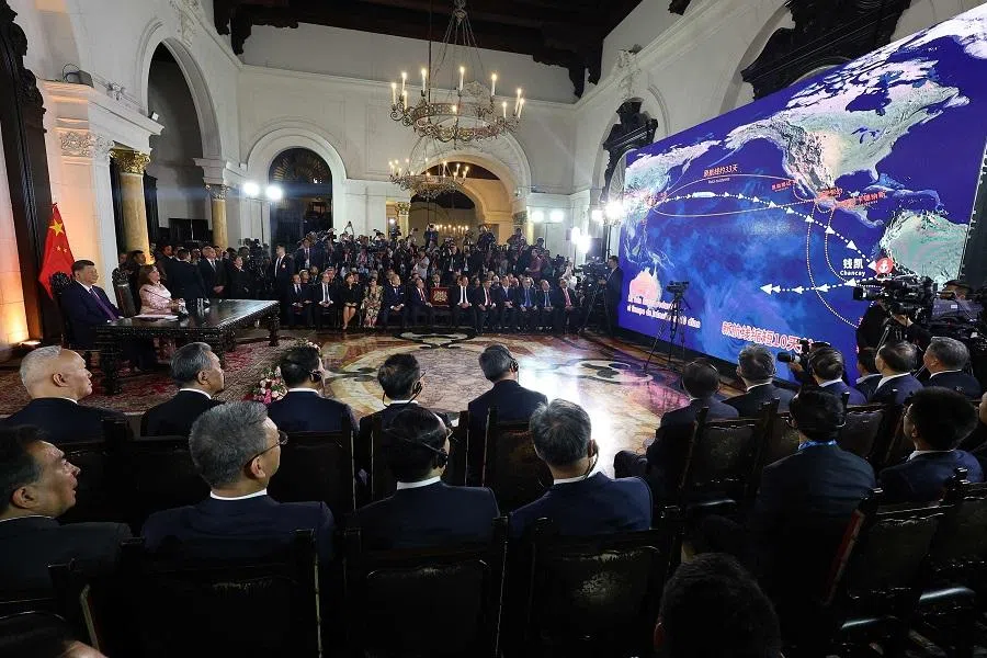 China’s President Xi Jinping (left) and Peru’s President Dina Boluarte attend the virtual inauguration ceremony of the Chancay “megaport” in the small town of Chancay, 78 kilometres north of the Peruvian capital, at the government palace in Lima on 14 November 2024, on the sidelines of the Asia-Pacific Economic Cooperation (APEC) summit. (Hugo Curotto/AFP)