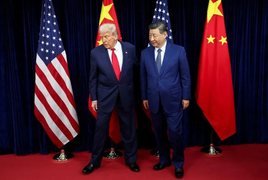 U.S. President Donald Trump and Chinese President Xi Jinping walk, as they hold a bilateral meeting at Gimhae International Airport on the sidelines of the Asia-Pacific Economic Cooperation (APEC) summit in Busan, South Korea, on 30 October 2025. (Evelyn Hockstein/Reuters)