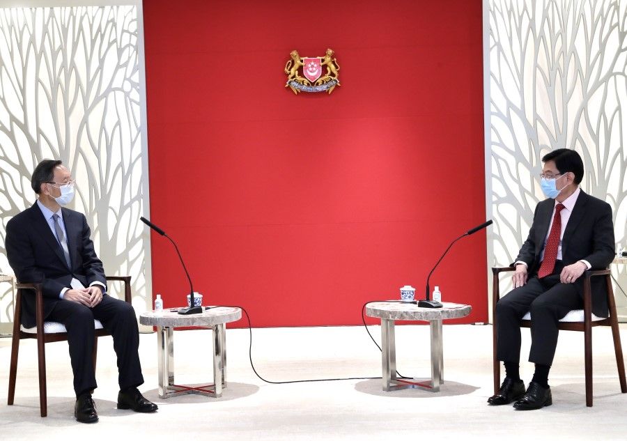 Yang Jiechi (left) called on Singapore's Deputy Prime Minister Heng Swee Keat, 20 August 2020. (MCI)
