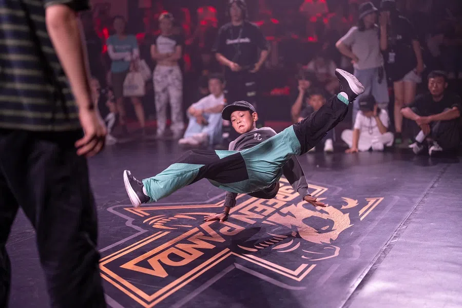 Niu Yiming performs at an underground breaking competition in Beijing on 28 June 2024.