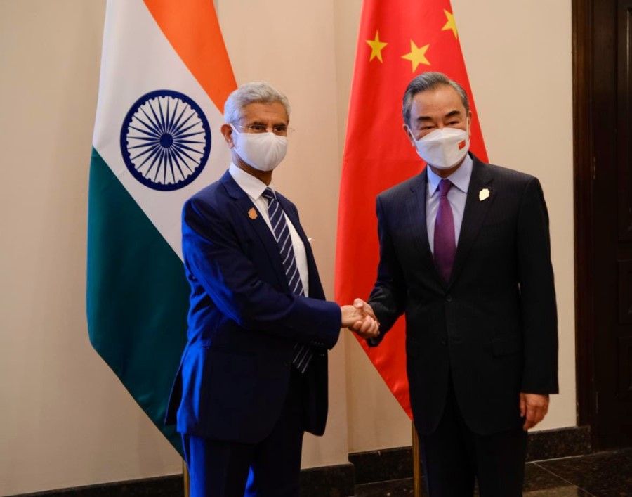 Indian External Affairs Minister S Jaishankar (left) met Chinese Foreign Minister Wang Yi on the sidelines of the G20 foreign ministers' meeting in Bali, 7 July 2022. (S Jaishankar/Twitter)