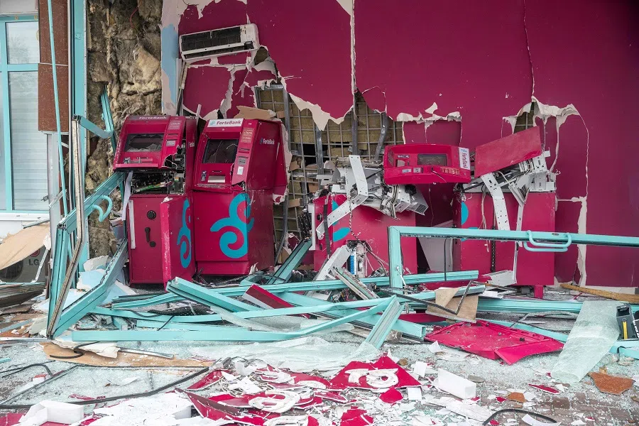 A photo shows a destroyed bank in central Almaty, Kazakhstan, on 8 January 2022, after violence that erupted following protests over hikes in fuel prices. (Alexandr Bogdanov/AFP)