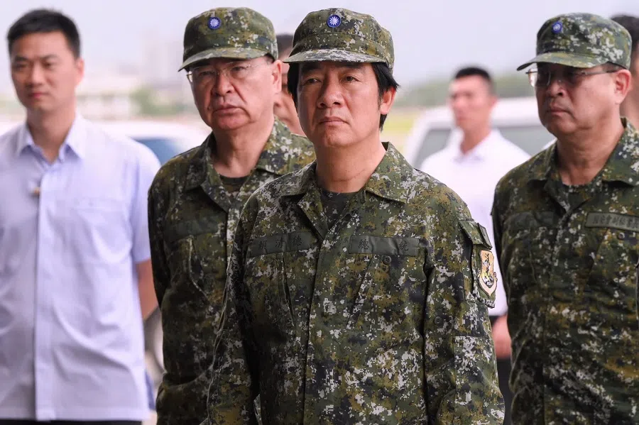 Taiwan’s President Lai Ching-te (C) arrives at an airforce base during an inspection of the troops as part of Taiwan’s annual Han Kuang military drills in Hualien on 23 July 2024. (Sam Yeh/AFP)