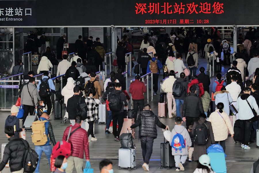 This photo taken on 17 January 2023 shows passengers arriving at Shenzhen North Railway Station during peak travel ahead of the Lunar New Year of the Rabbit, in China's southern Guangdong province. (CNS/AFP)