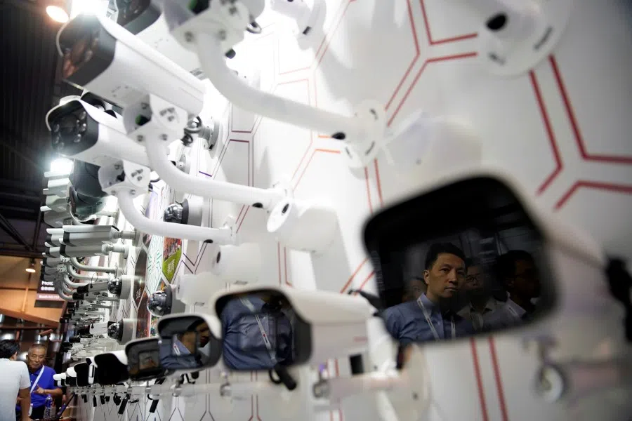 Surveillance cameras at the annual Huawei Connect event in Shanghai. Critics warn China's social credit system enables authorities to define "desirable and undesirable behaviour" and could allow unparalleled control of citizens' lives. (Reuters)