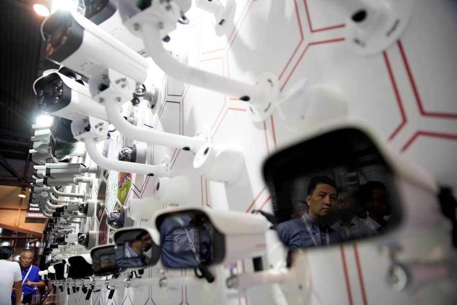 Surveillance cameras at the annual Huawei Connect event in Shanghai. Critics warn China's social credit system enables authorities to define "desirable and undesirable behaviour" and could allow unparalleled control of citizens' lives. (Reuters)