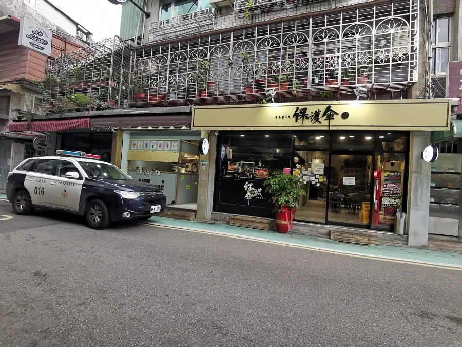 A patrol car outside the Aegis restaurant.
