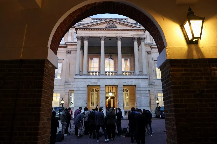 Members of the media gather outside Lancaster House, on the second day scheduled for trade talks between the US and China, in London, Britain, on 10 June 2025.