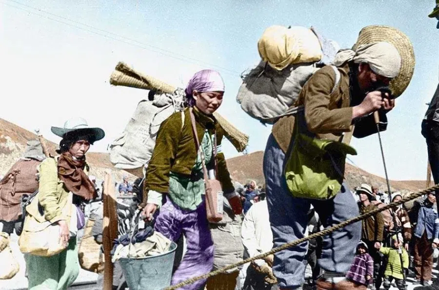 Japanese people boarding a transport vessel to go back to Japan, spring 1945.