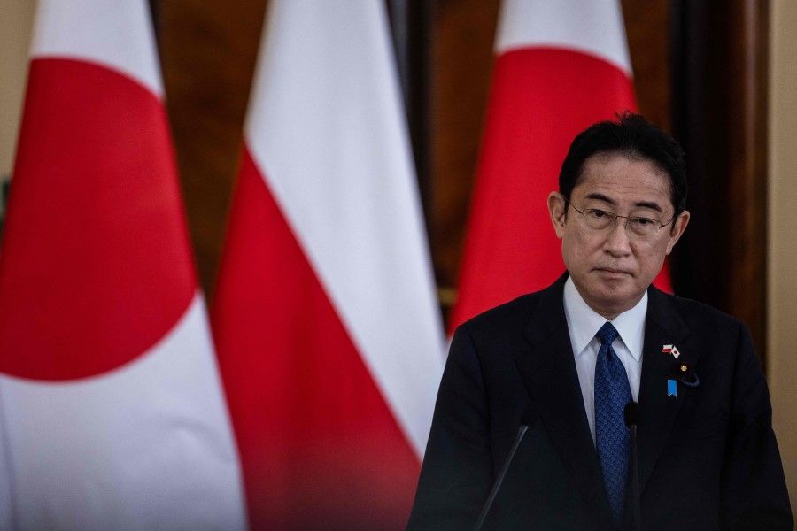 Japan's Prime Minister Fumio Kishida speaks during a joint press conference following a meeting in Warsaw, 22 March 2023. (Wojtek Radwanski/AFP)
