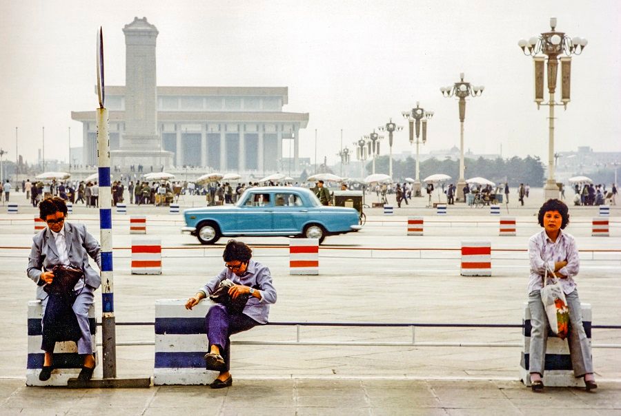 Women sit at Tiananmen Square, Beijing, China, 1981. (iStock)