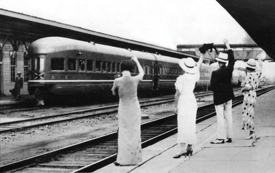 People sending off the Asia Express at the Manchurian Railway platform, circa 1935. This is a propaganda photo by the Japanese government, to show the progress and happiness of “Manchukuo”.