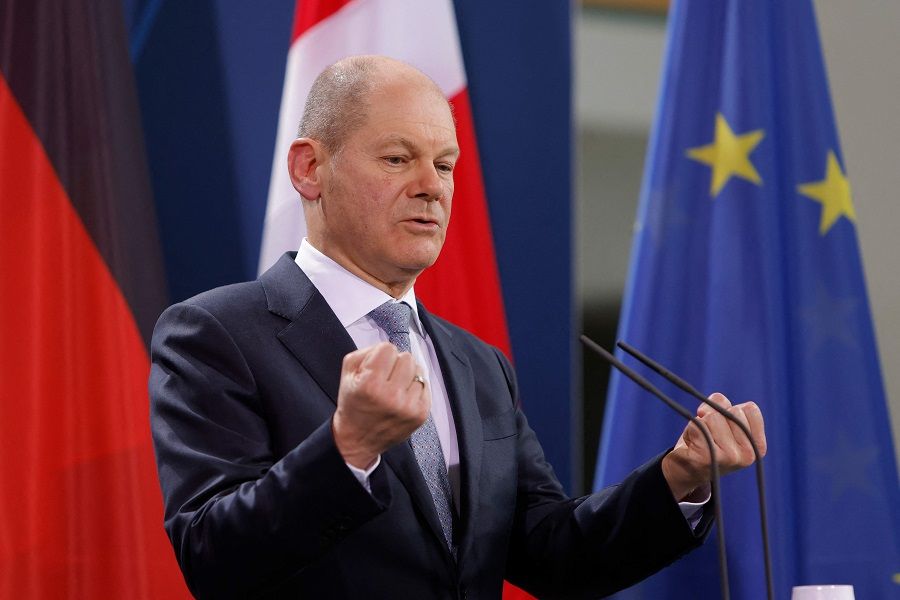 German Chancellor Olaf Scholz gesticulates during a joint press conference with Danish Prime Minister following talks at the Chancellery on 9 February 2022 in Berlin, Germany. (Michele Tantussi/Pool/AFP)