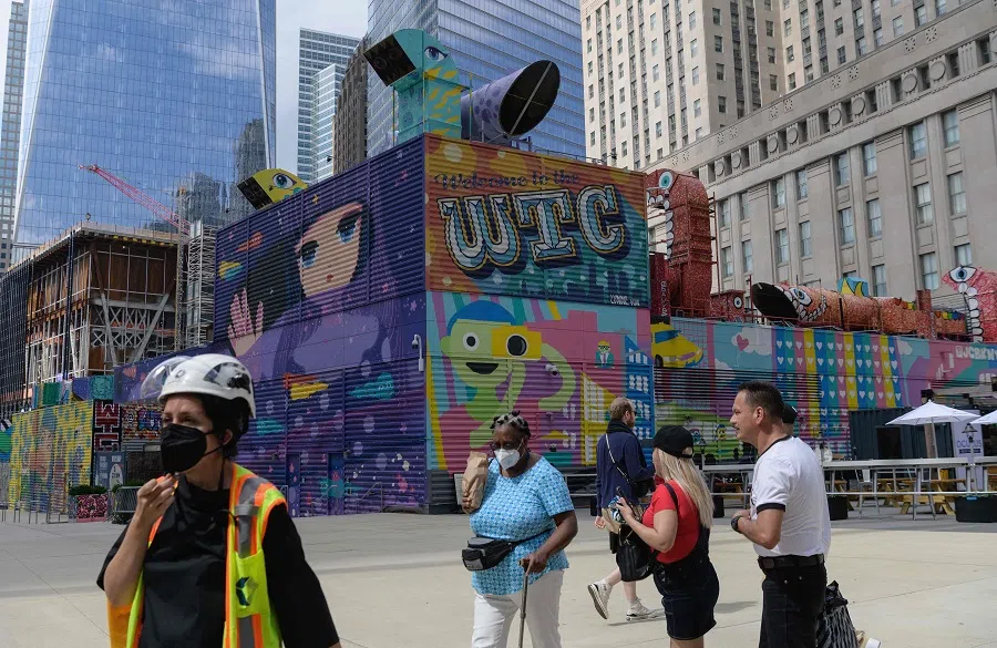 People walk near the the National September 11 Memorial & Museum at World Trade Center in New York, US, on 8 September 2021. (Angela Weiss/AFP)