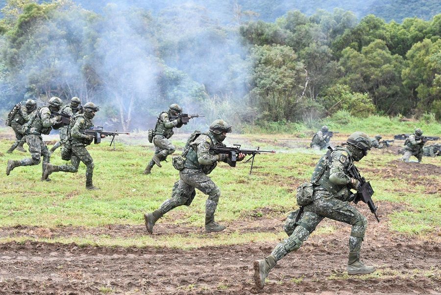 This file photo taken on 30 January 2018 shows Taiwanese soldiers staging an attack during an annual drill at a military base in Hualien, Taiwan. (Mandy Cheng/AFP)