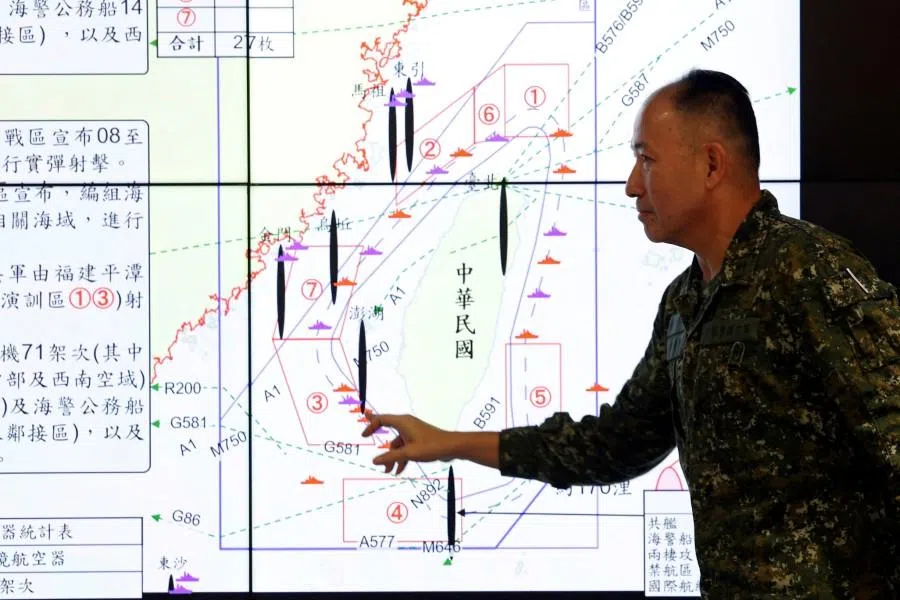 Hsieh Jih-sheng, deputy chief of the general staff for intelligence at Taiwan’s defence ministry, points at a map during a press conference about China’s military drills around Taiwan, in Taipei, Taiwan, on 30 December 2025.