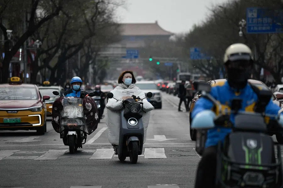 Traffic along a shopping street in Beijing, China, on 8 April 2025. (Wang Zhao/AFP)