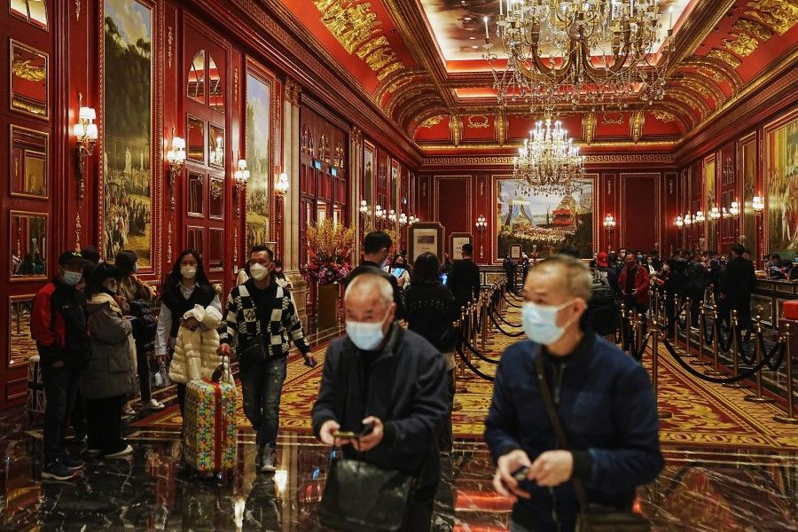 Visitors at the Venetian Macao hotel, which is operated by Sands China, during Lunar New Year in Macau, China, 24 January 2023. (Lam Yik/Reuters)