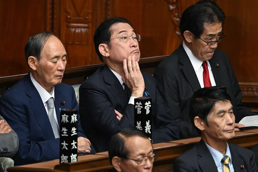 Former Japanese prime ministers Yoshihide Suga (left) and Fumio Kishida (centre) listen as Japan’s new Prime Minister Shigeru Ishiba delivers his inaugural policy address in the lower house of parliament in Tokyo, Japan, on 4 October 2024. (Philip Fong/AFP)