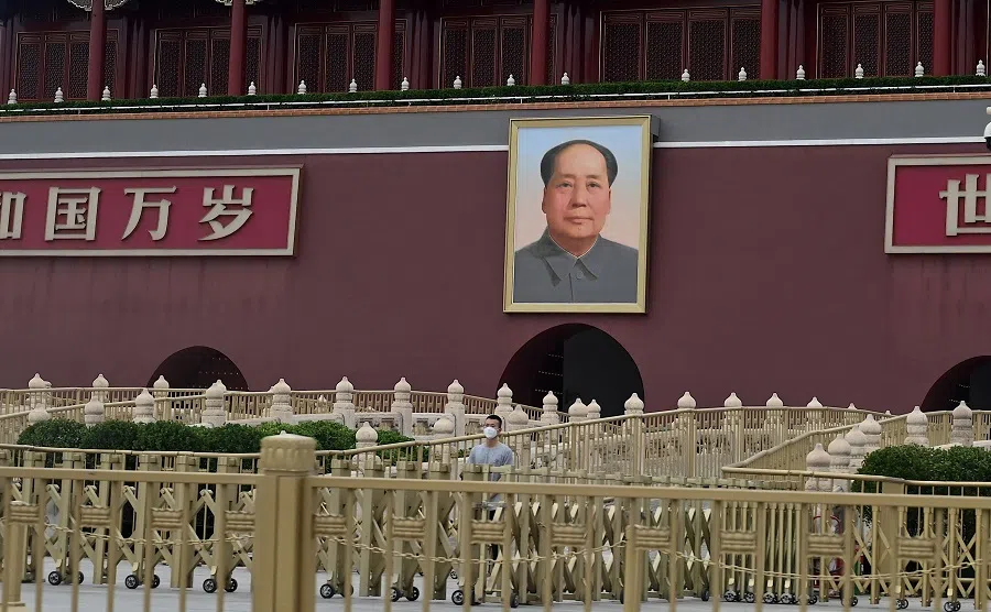 A plain clothes security personnel stands guard in front of the Tiananmen Gate in Beijing, China, on 4 June 2022. (Noel Celis/AFP)