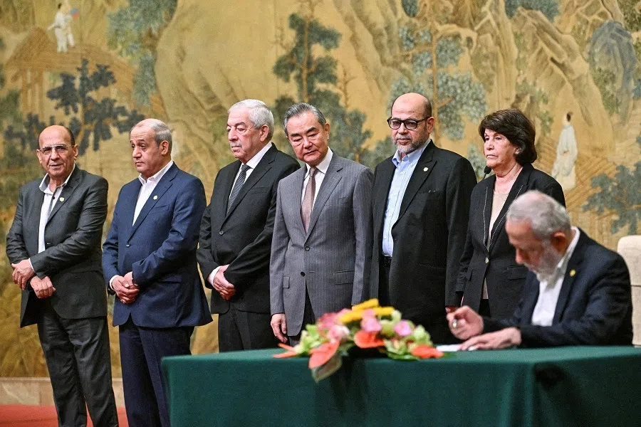 China’s Foreign Minister Wang Yi looks on during the signing of the “Beijing declaration” at the Diaoyutai State Guesthouse in Beijing, China, on 23 July 2024. (Pedro Pardo/Reuters)