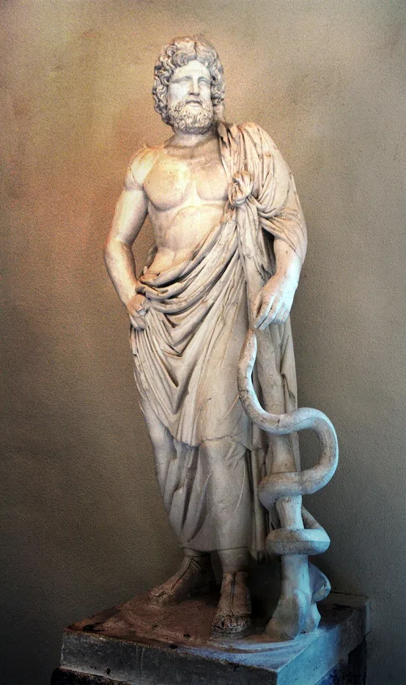 A statue of Asclepius with his serpent-entwined staff, exhibited in the Museum of Epidaurus Theatre. (Photo: Michael F. Mehnert/Licensed under CC BY-SA 3.0)