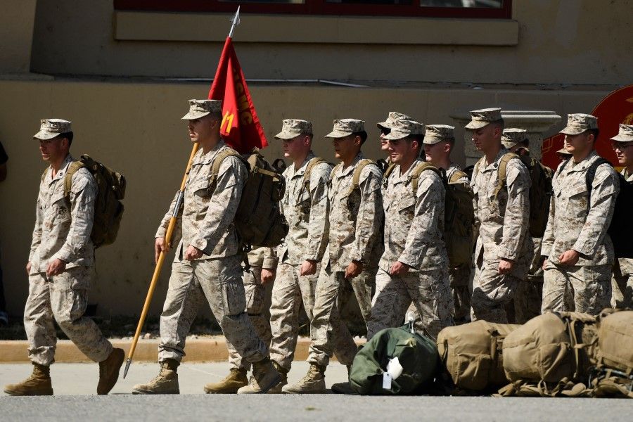 Marines deployed to Afghanistan arrive in formation for their homecoming at US Marine Corps Base Camp Pendleton in Oceanside, California on 3 October 2021. (Patrick T. Fallon/AFP)