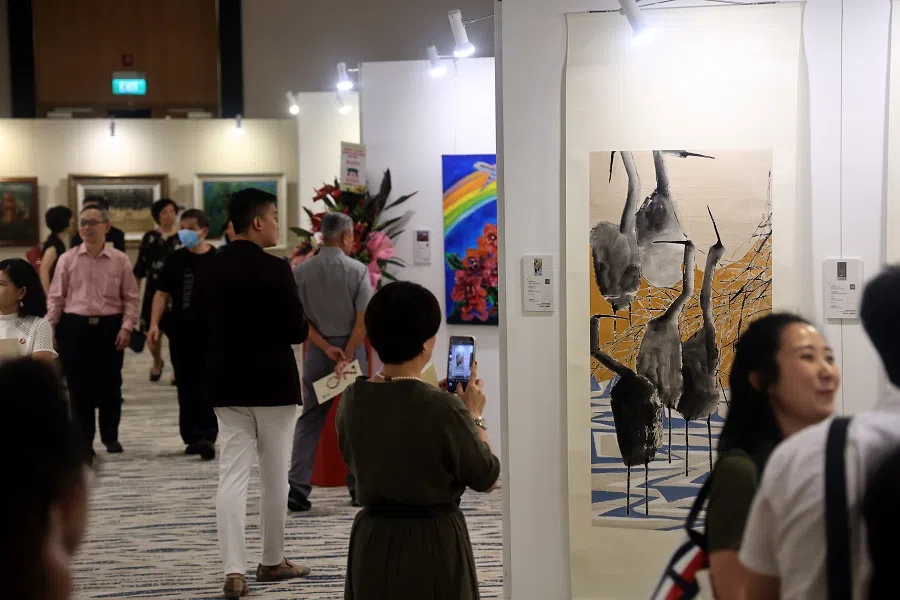 Visitors at the 100 Years of Singapore Art exhibition, co-organised by SPH Media CMG in celebration of 100 years of Lianhe Zaobao. (SPH Media)