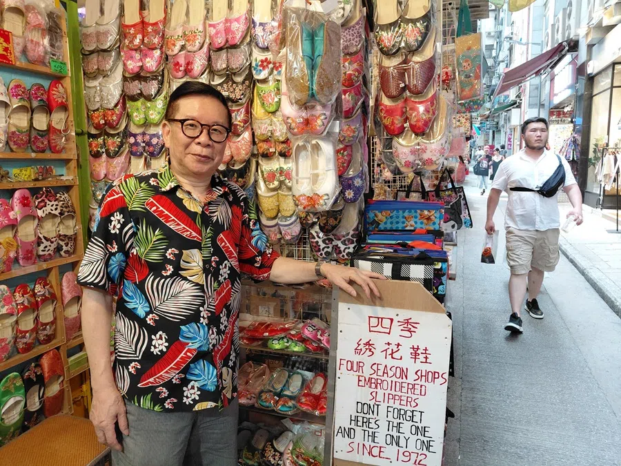 Shopkeeper Chan Lam runs the Four Season Shops Embroidered Slippers on Li Yuen Street East in the Central district. (Tai Hing Shing/SPH Media)