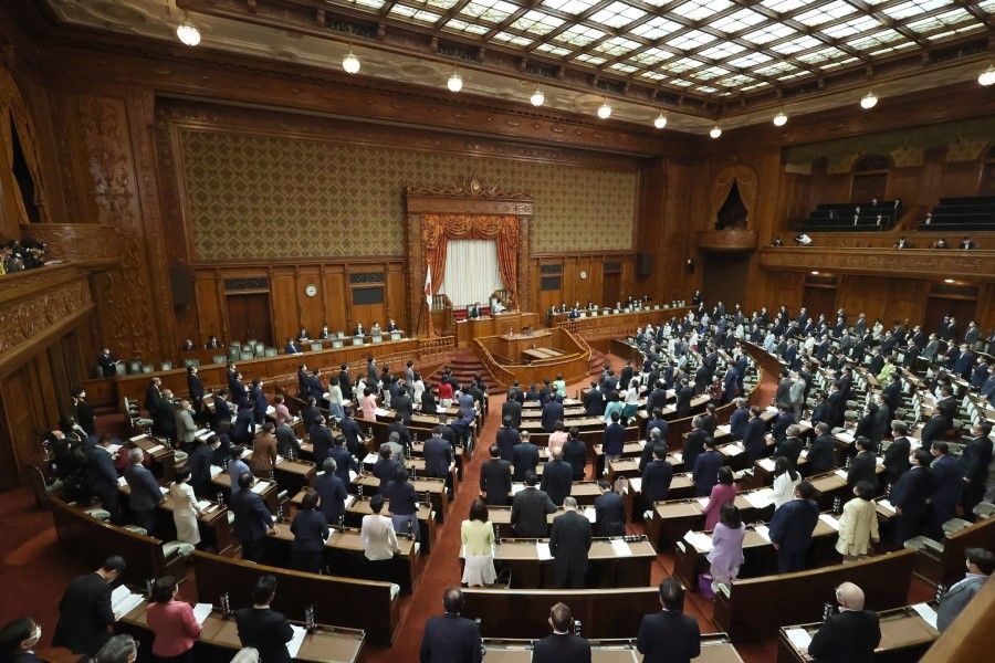 This general view shows Japanese lawmakers at upper house of the parliament in Tokyo on 15 June 2022. (AFP)