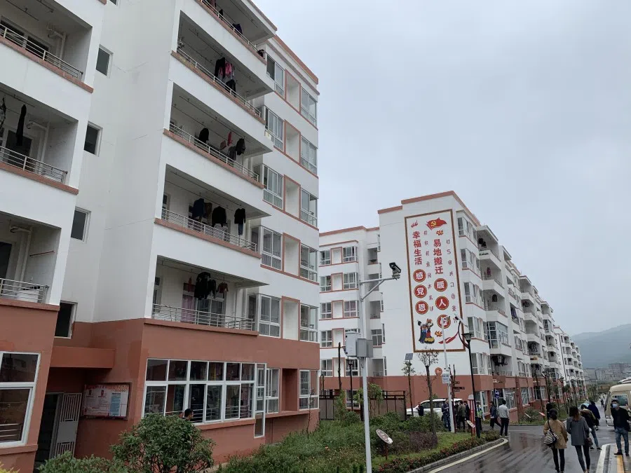 The Chengbei Gan En Community, a housing development in Sichuan's mountainous Liangshan Yi Autonomous Prefecture, houses 6,600 residents who were relocated here as part of China's anti-poverty campaign. The slogan on the wall reads: "For a happy life, thank the Party. Relocation warms the heart." (SPH)