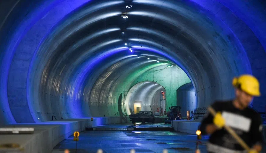 Workers are seen in a tunnel of the Stuttgart 21 railway project at the main station in Stuttgart, southern Germany, on 9 August 2021. (Thomas Kienzle/AFP)
