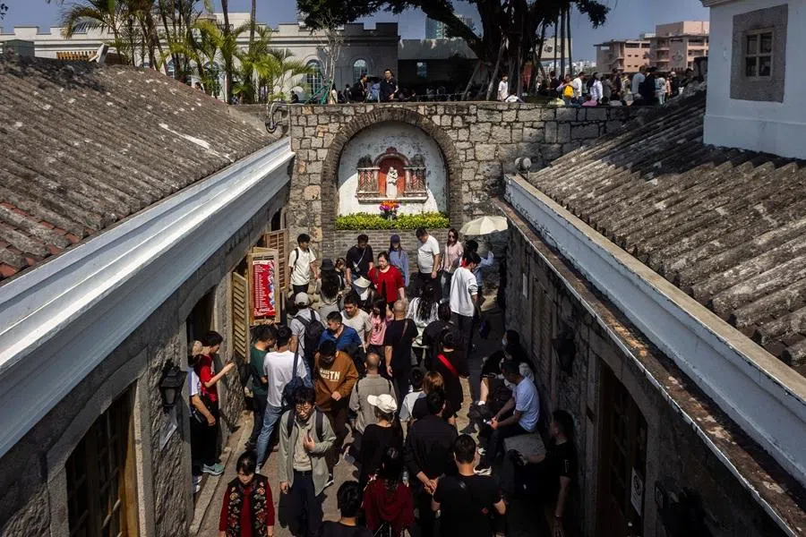 Tourists walk around Monte Fort during the Chinese New Year holiday in Macau on 20 February 2026. (Eduardo Leal/AFP)