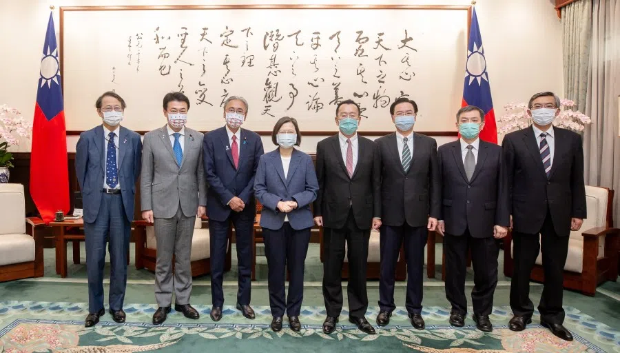 Taiwan President Tsai Ing-wen pose for a photo with the member of the House of Representatives of Japan Furuya Keiji and other members of the delegation at the presidential office in Taipei, Taiwan in this handout image released 23 August 2022. (Taiwan Presidential Office/Handout via Reuters)