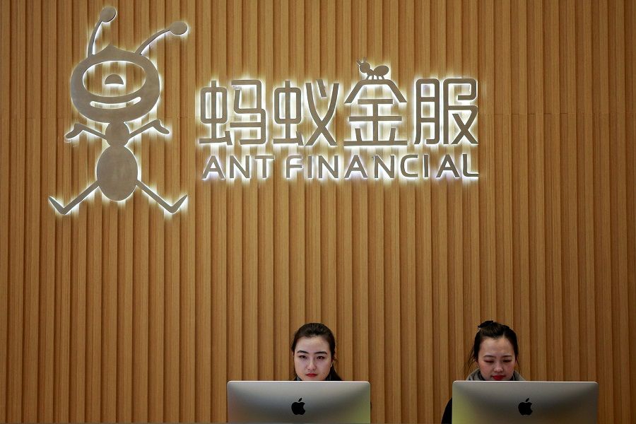Employees are seen at the reception desk of Ant Financial Services Group, Alibaba's financial affiliate, at its headquarters in Hangzhou, Zhejiang province, China, 24 January 2018. (Shu Zhang/File Photo/Reuters)