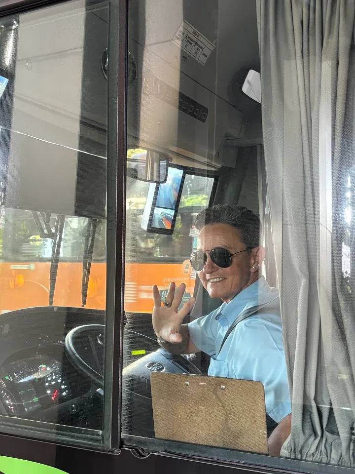 Bus driver Alexandra enjoys driving the electric buses on the Green Line. (Lim Zhan Ting/SPH Media)