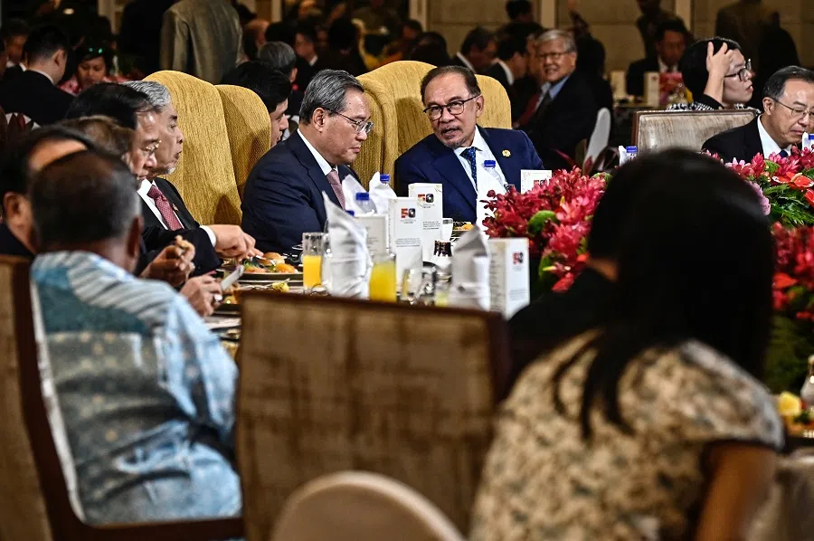 Malaysia Prime Minister Anwar Ibrahim speaks to China’s Premier Li Qiang during a ceremony to celebrate the 50th Anniversary of Malaysia-China diplomatic relations at Kuala Lumpur, Malaysia, on 19 June 2024. (Shaiful Nizal/Department of Information Malaysia/Handout via Reuters)