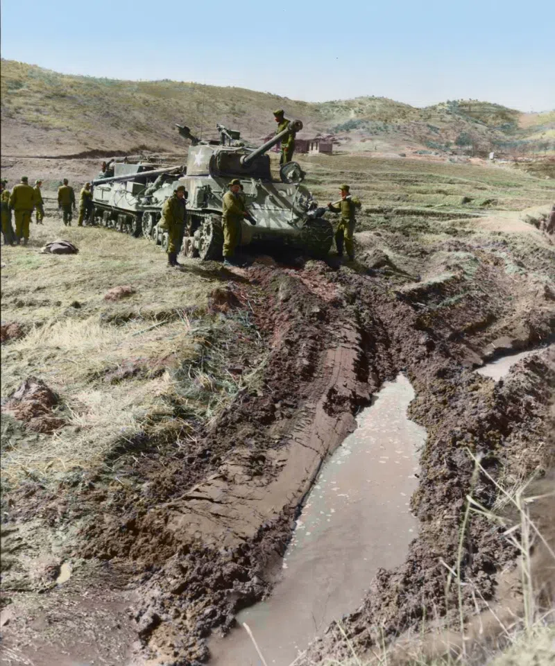 A US M4A3E8 tank on the Korean peninsula, March 1951. The US troops were regrouping and preparing to use their advantage in mechanisation to launch a counterattack.