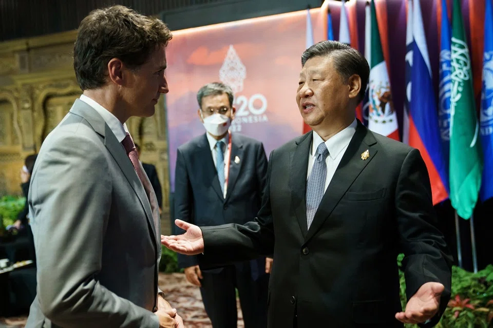 Canada's Prime Minister Justin Trudeau speaks with China's President Xi Jinping at the G20 summit in Bali, Indonesia, 16 November 2022. (Adam Scotti/Prime Minister's Office/Handout via Reuters)
