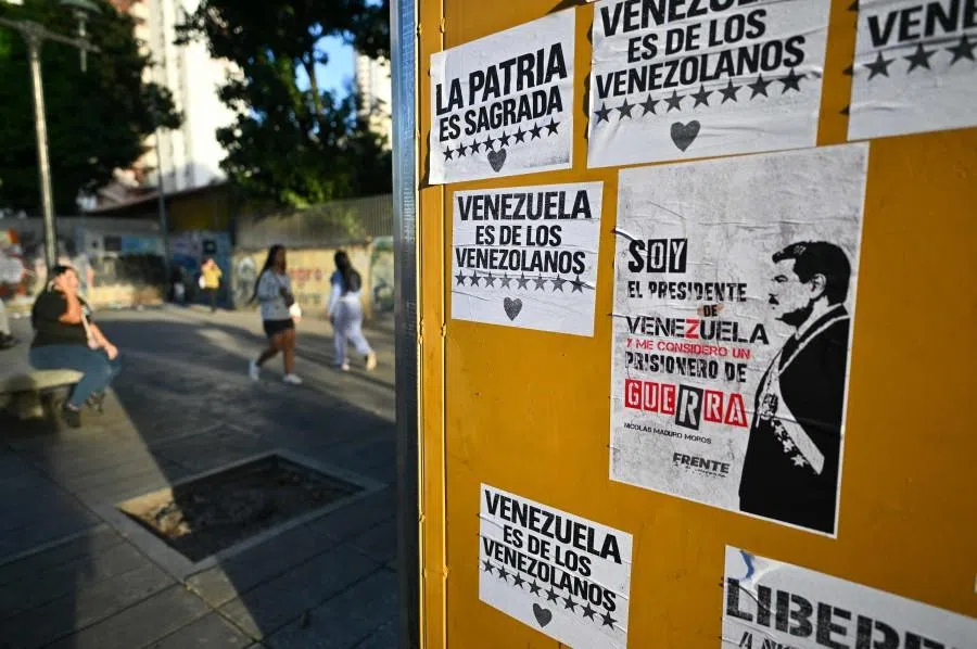 Signs in support of Venezuela’s ousted President Nicolas Maduro, at a bus stop in Caracas on 12 January 2026.