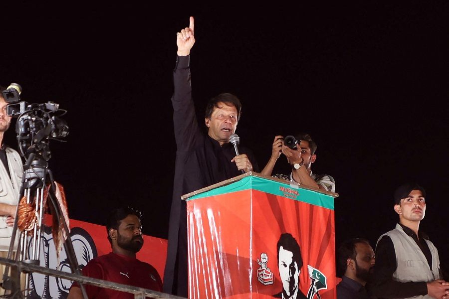 Former Pakistani Prime Minister Imran Khan, who was ousted by opposition parties through a no-confidence motion, addresses the supporters of the Pakistan Tehreek-e-Insaf party during a public rally in Jhelum, Pakistan, on 10 May 2022. (Raja Imran/AFP)