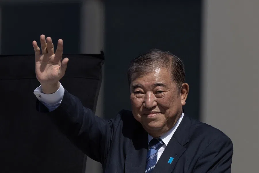 Shigeru Ishiba, Japan’s prime minister, waves as he delivers a campaign speech in Osaka, Japan, on 20 October 2024.