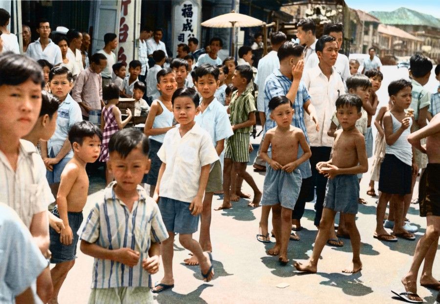 Children on the streets, 1960s. The post-war baby boom led to a crowded society.