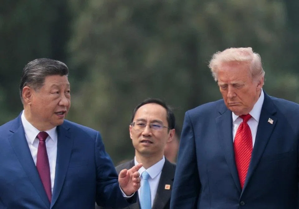 US President Donald Trump and Chinese President Xi Jinping tour the Temple of Heaven in Beijing, China, 14 May 2026. (Evan Vucci/Reuters)