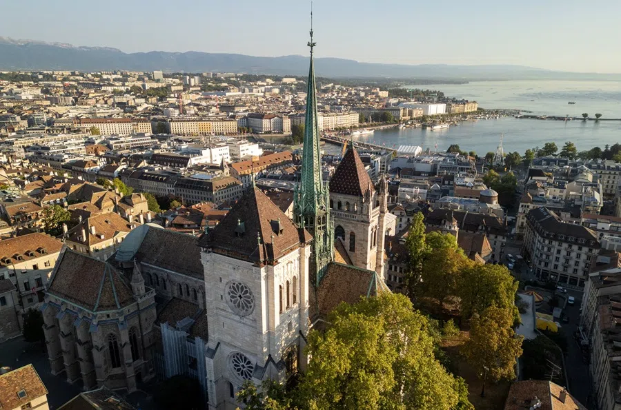 A drone view shows the St. Pierre Cathedral and Lake Leman in Geneva, Switzerland, on 26 August 2025. (Denis Balibouse/Reuters)