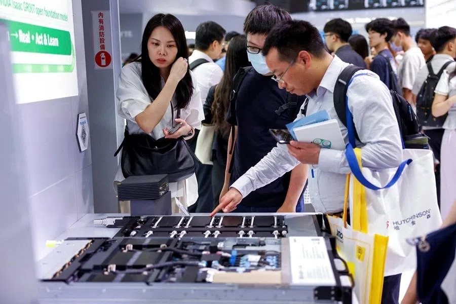 People study GPU servers at the Gigabyte Technology booth during the annual Computex trade show in Taipei, Taiwan, on 3 June 2026.